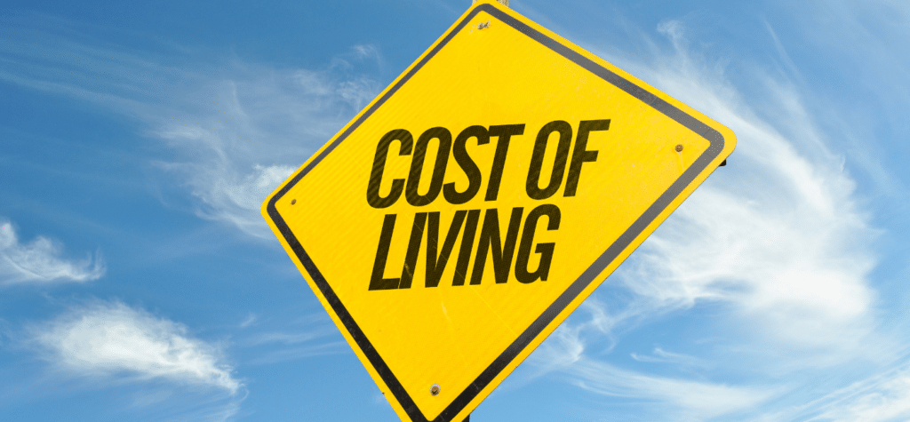 Sign showing cost of living in San Diego vs. Los Angeles
