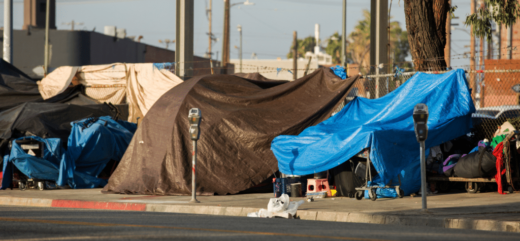 photo showing tent city depicting crimes - living in san diego vs. los angeles