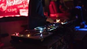 photo of dj spinning and getting people to dance showing the best san diego clubs.