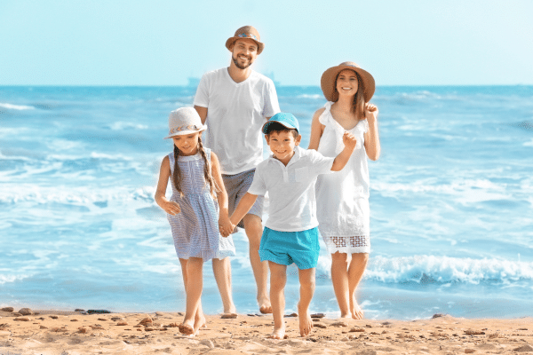 photo of family at beach showing family-friendly neighborhoods san diego